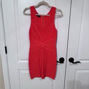 bebe Mini Bandage Drees. Center back zipper. Color RED. Size S.